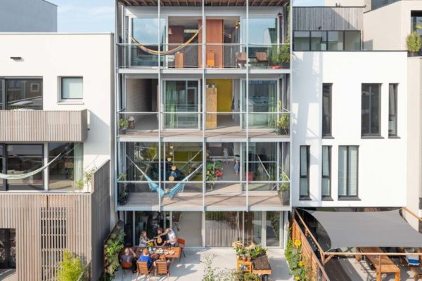 three generation house by BETA daytime photo south facade with balconies by Ossip